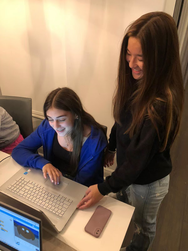Girls coding at workshop